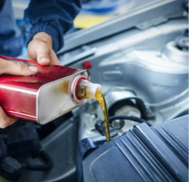 mechanic-changing-engine-oil-car-vehicle